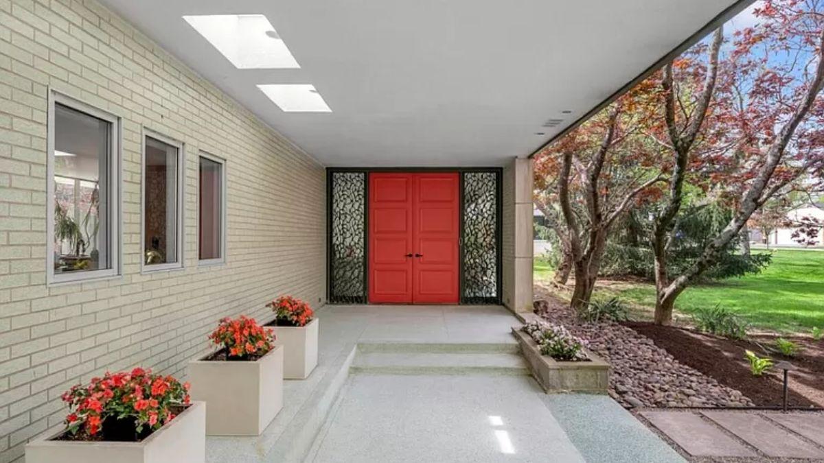 Check Out That Bold Red Door Against the Subdued Brick