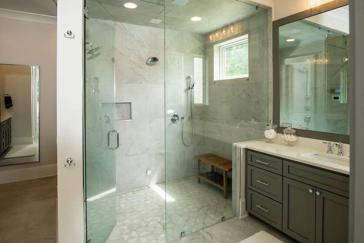 Notice the Seamless Glass Shower in This Elegant Bathroom Retreat
