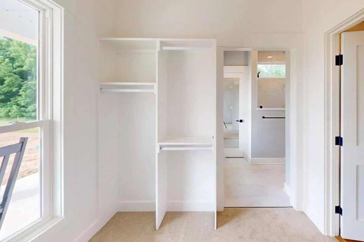 Functional Elegance: Walk-In Closet with a View