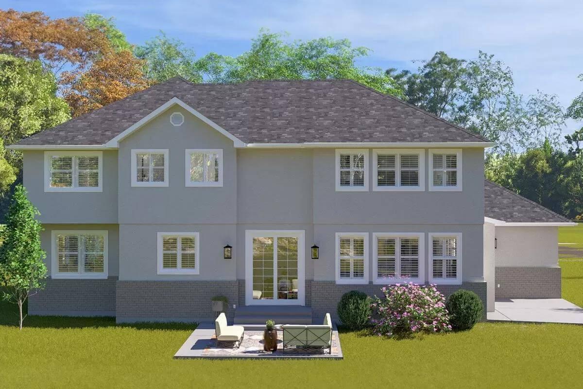 Charming Rear View with a Cozy Patio Retreat