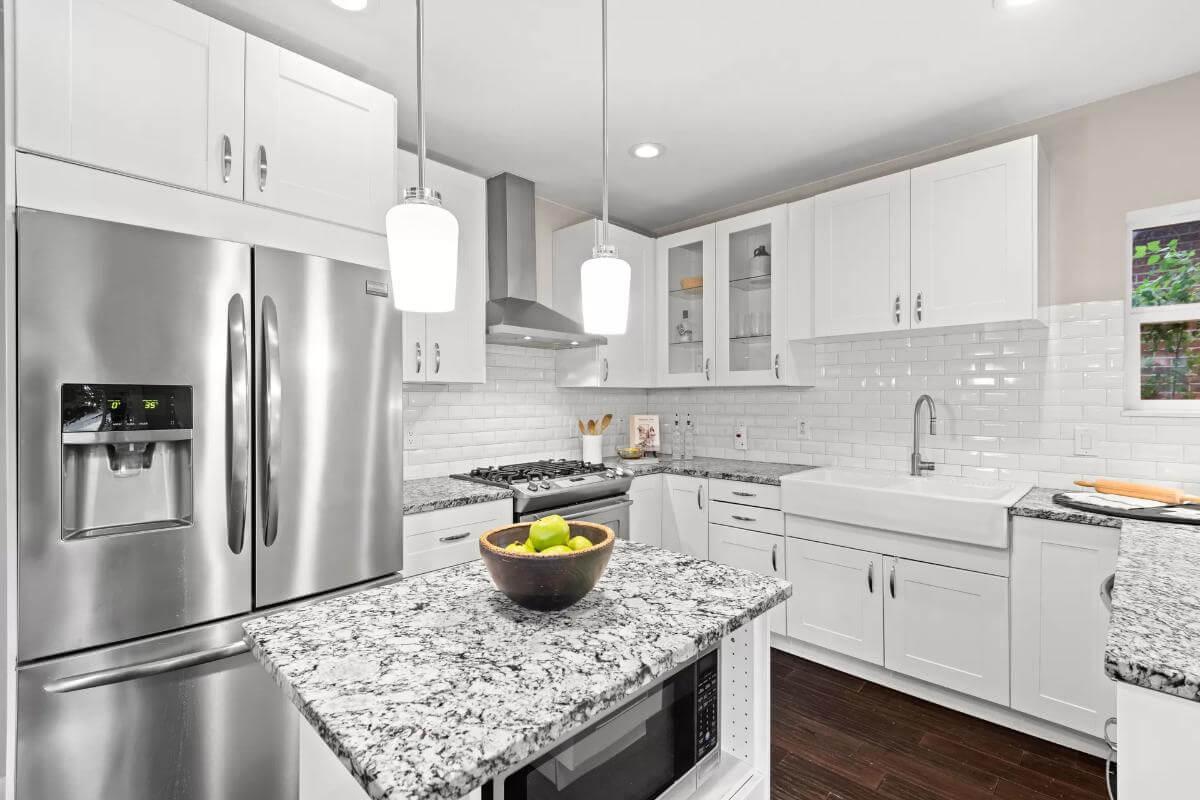 Efficient Craftsman Kitchen with Granite Countertops