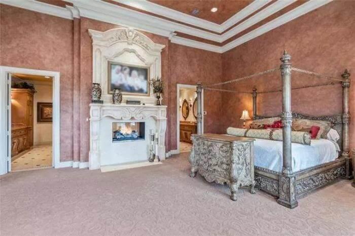 Richly Textured Bedroom with Ornate Four-Poster Bed