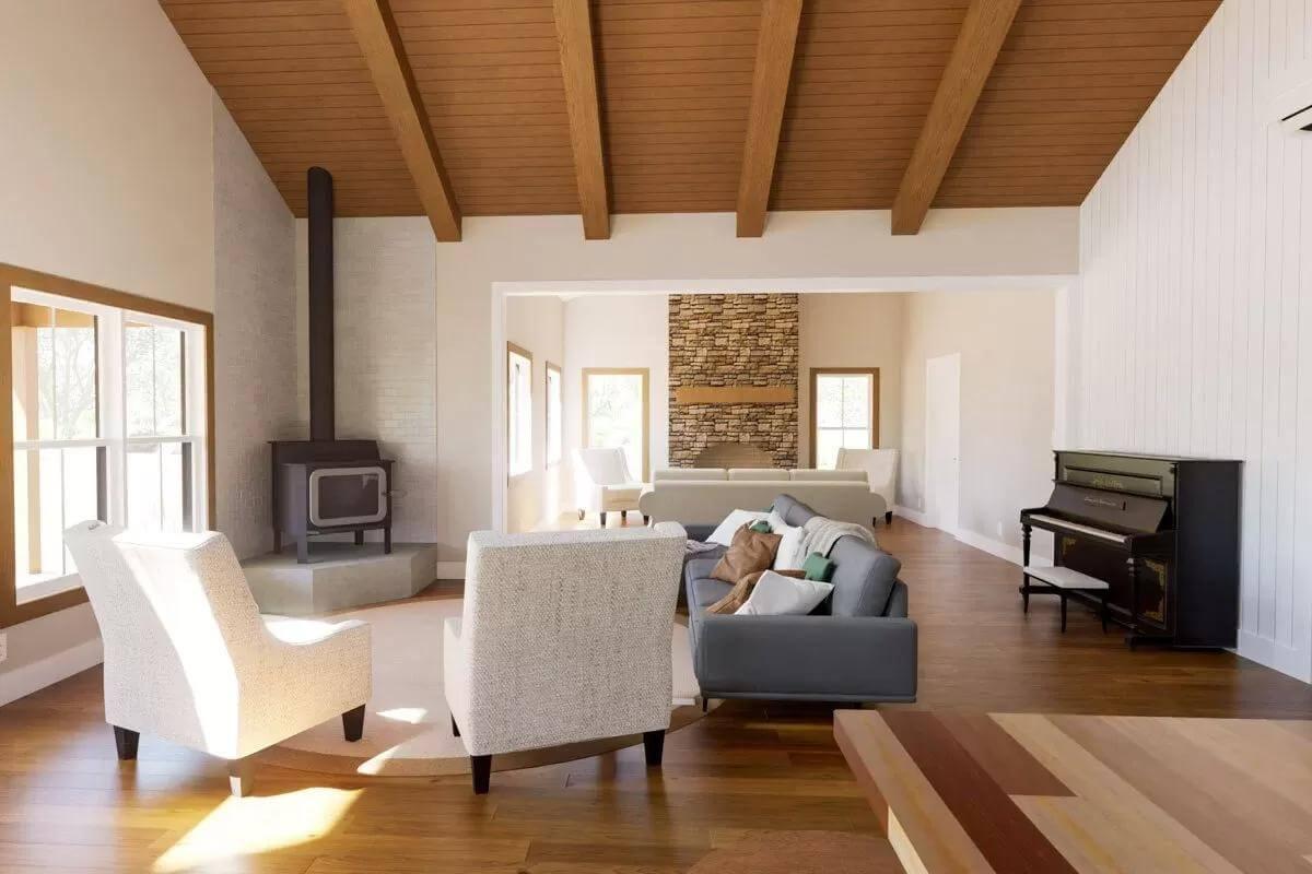 Open Living Room with Warm Wood Accents and Dual Fireplaces to Explore