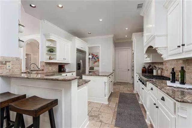 Modern Kitchen with Granite Counters and Subway-Tile Backsplash