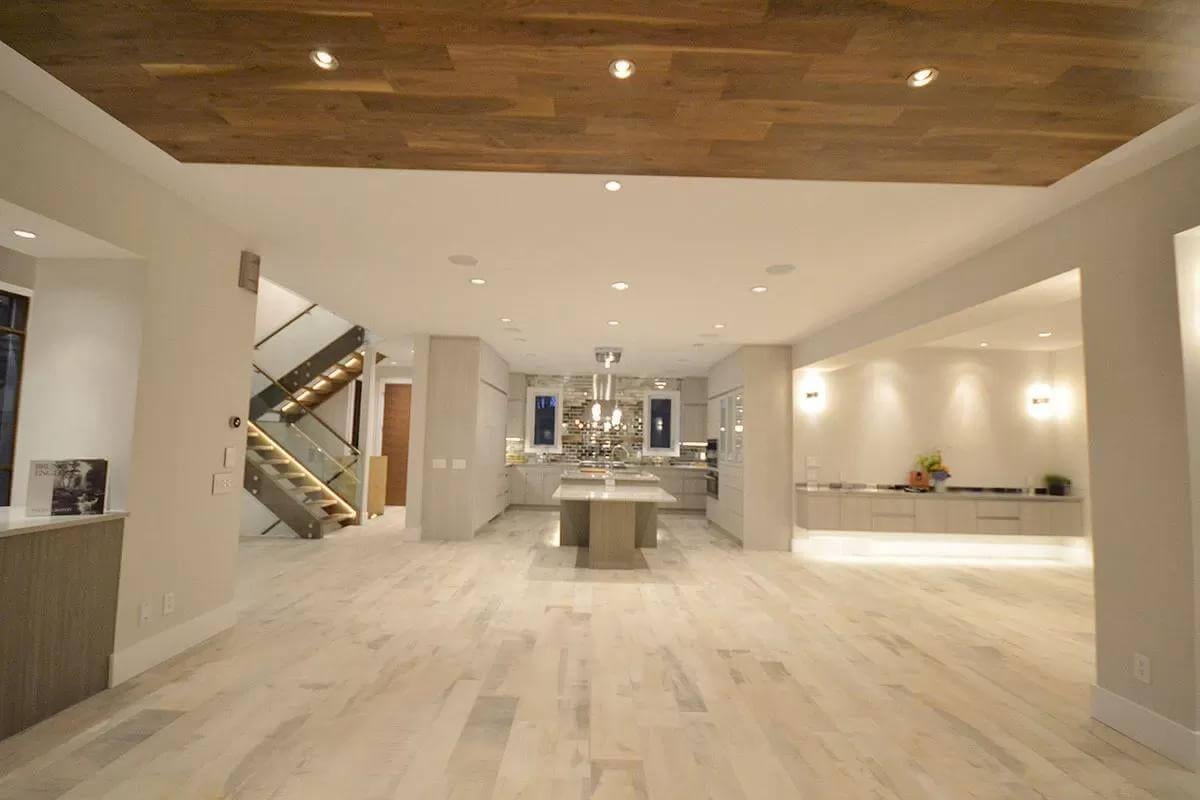 Check Out This Open Kitchen with a Stunning Island and Wood Accents