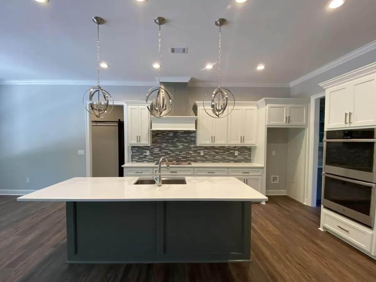 Check Out the Modern Island and Pendant Lighting in This Craftsman Kitchen