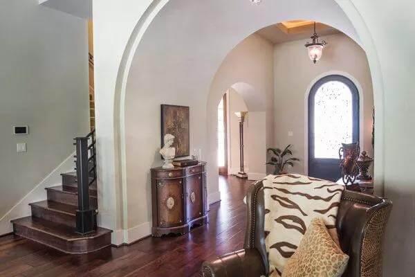 Notice the Graceful Archways Defining This Elegant Entryway