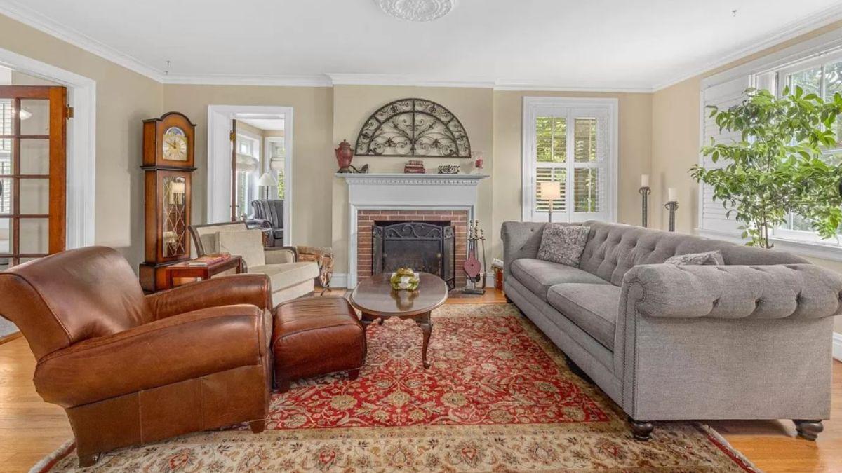 Elegant Living Room with Classic Mantel and Warm Hardwood Floors