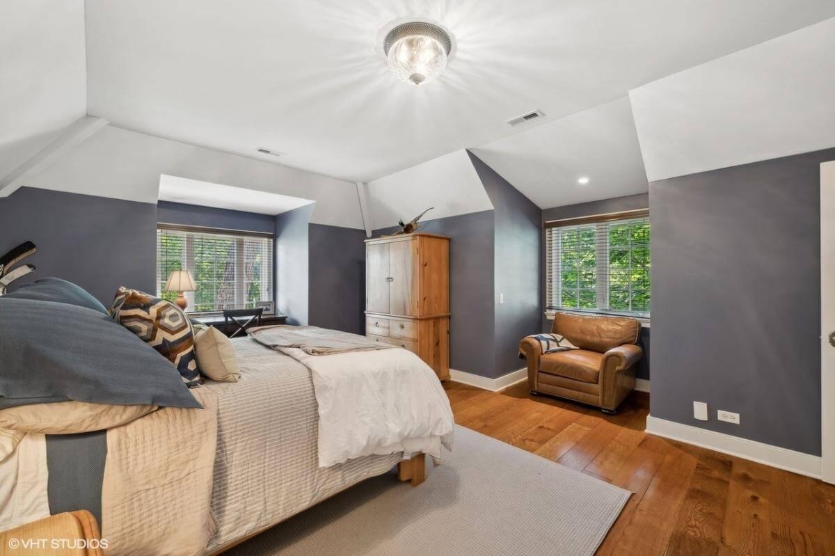 Cozy Alcove Bedroom with Inviting Leather Armchair