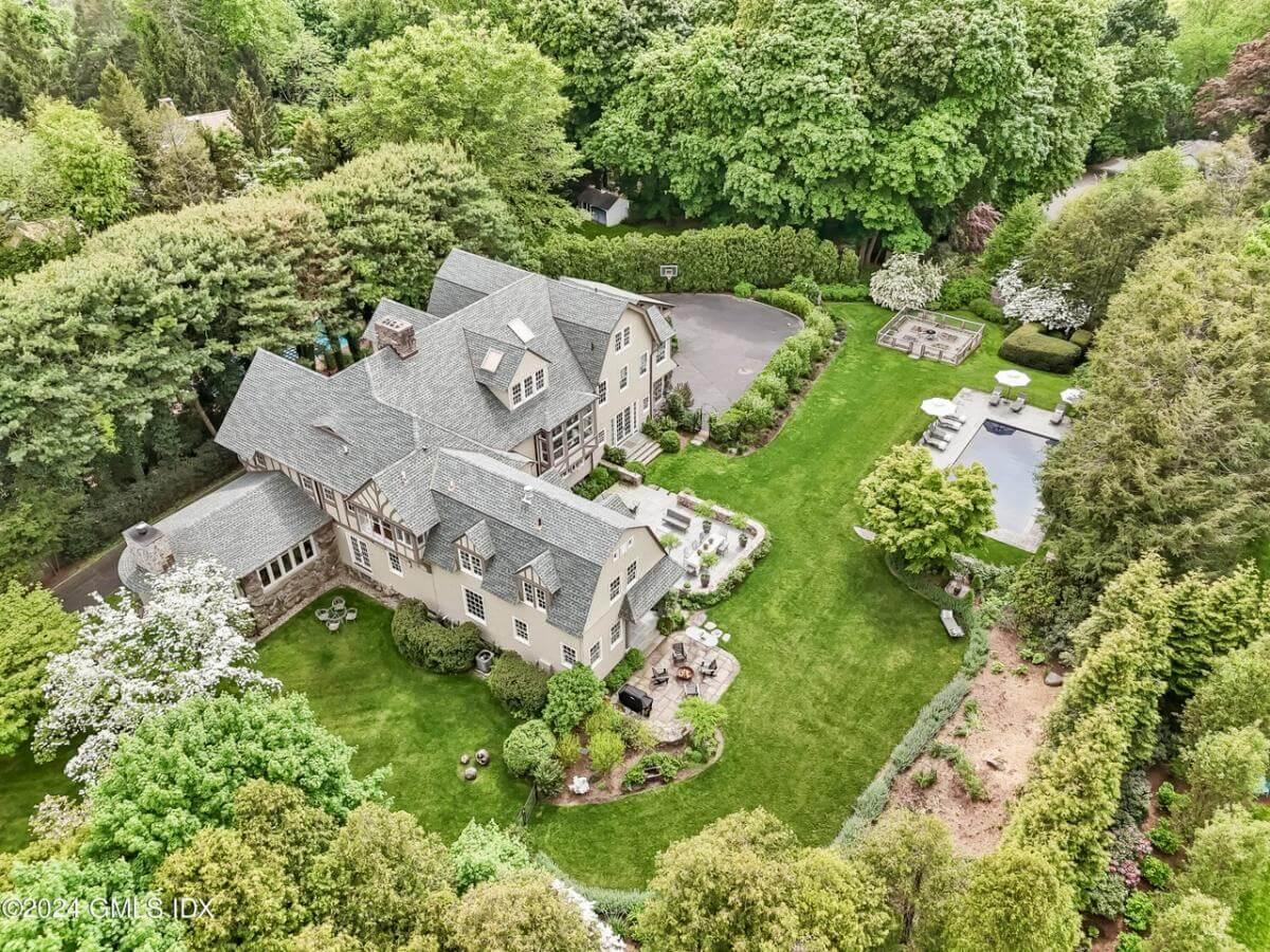 Explore This Tudor-Style Home Surrounded by Verdant Nature