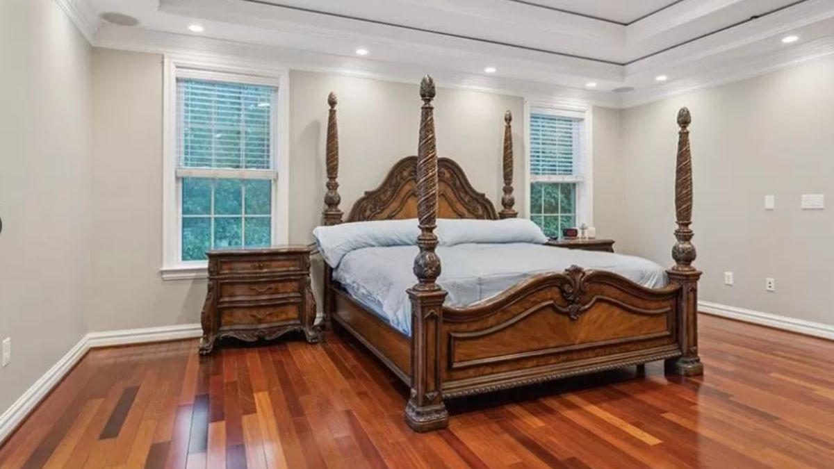 Step Into This Regal Bedroom with Ornate Four-Poster Bed