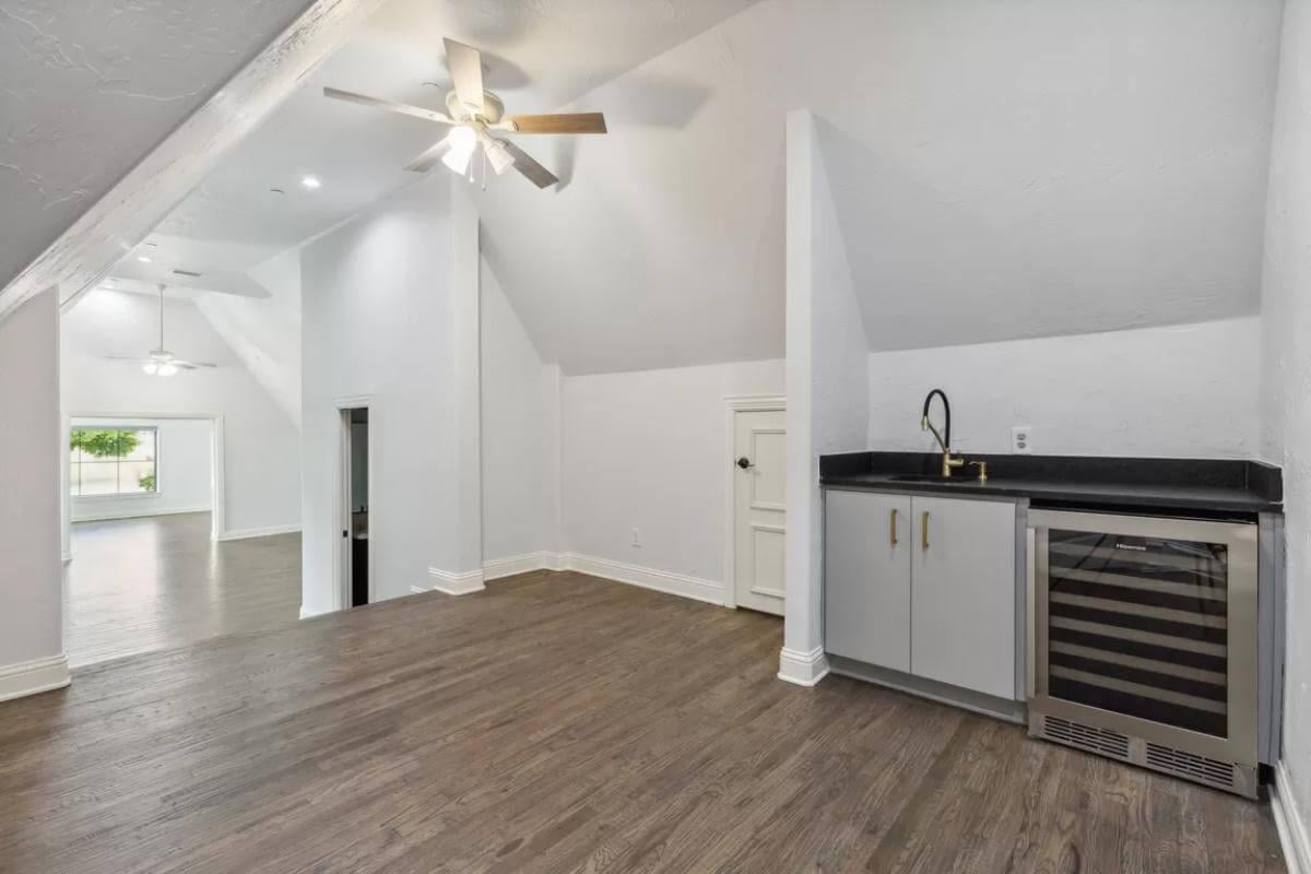 Versatile Upper-Level Space with a Handy Wet Bar