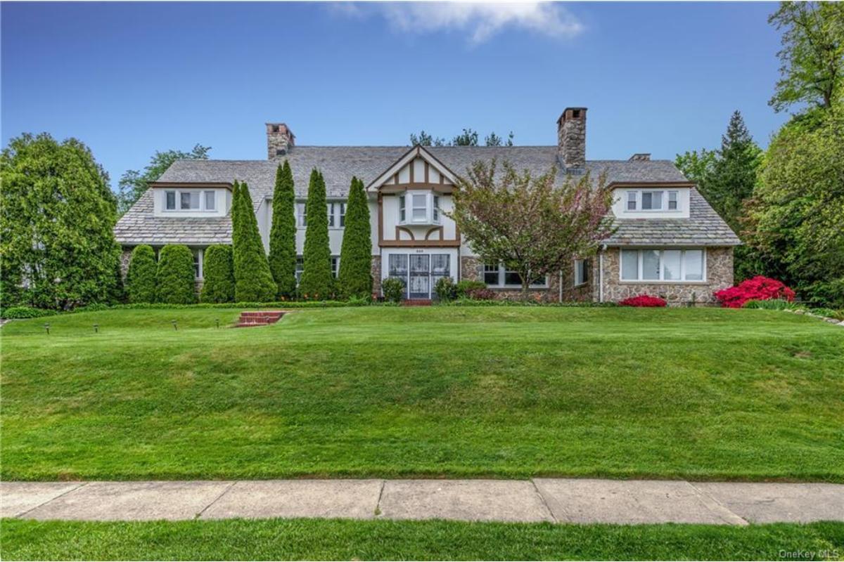 Embrace the Classic Elegance of This Stone Manor
