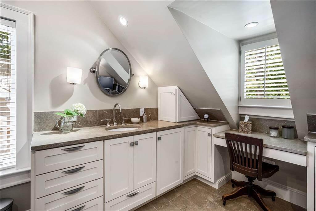 Explore This Clever Attic Vanity With Built-In Desk Space