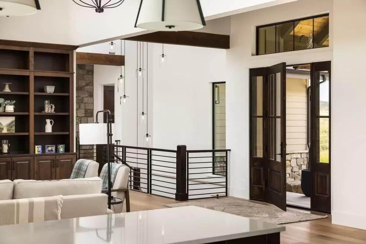 Explore the Craftsman Charm with Dark Wood Accents and Open Railings