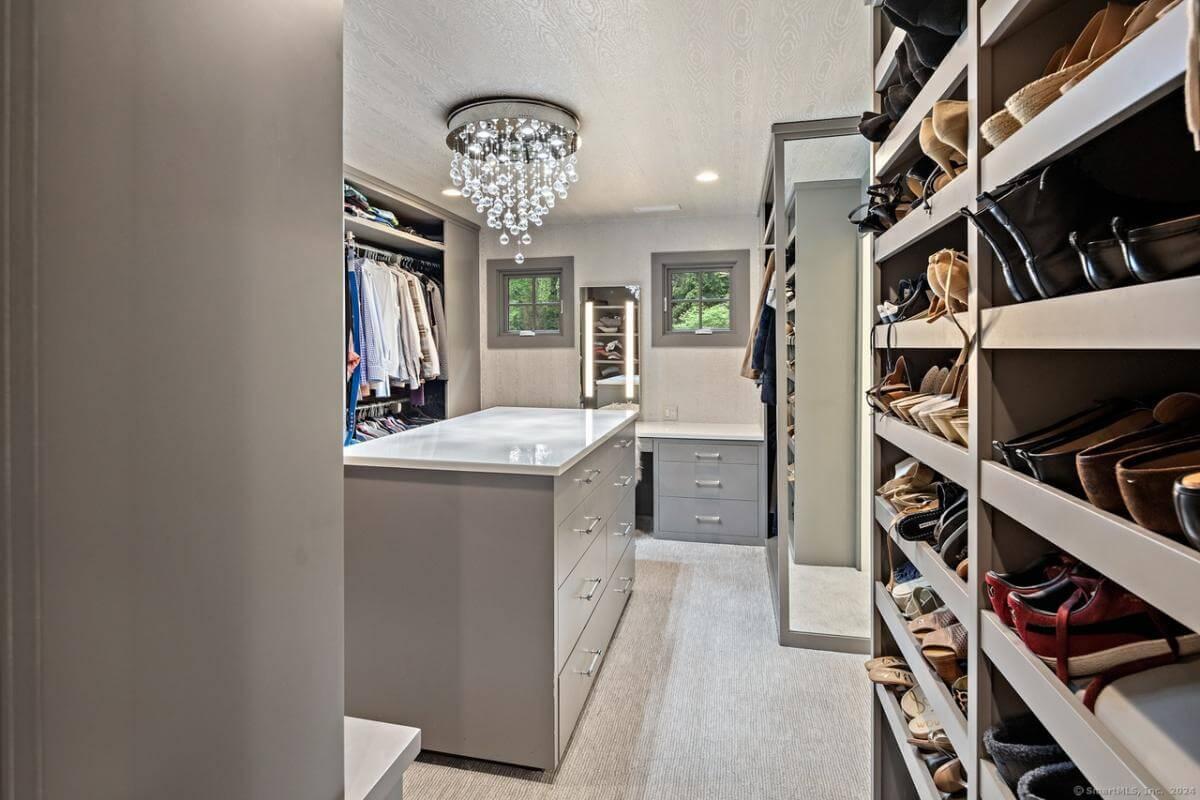 Step Into This Luxurious Walk-In Closet with a Stunning Chandelier