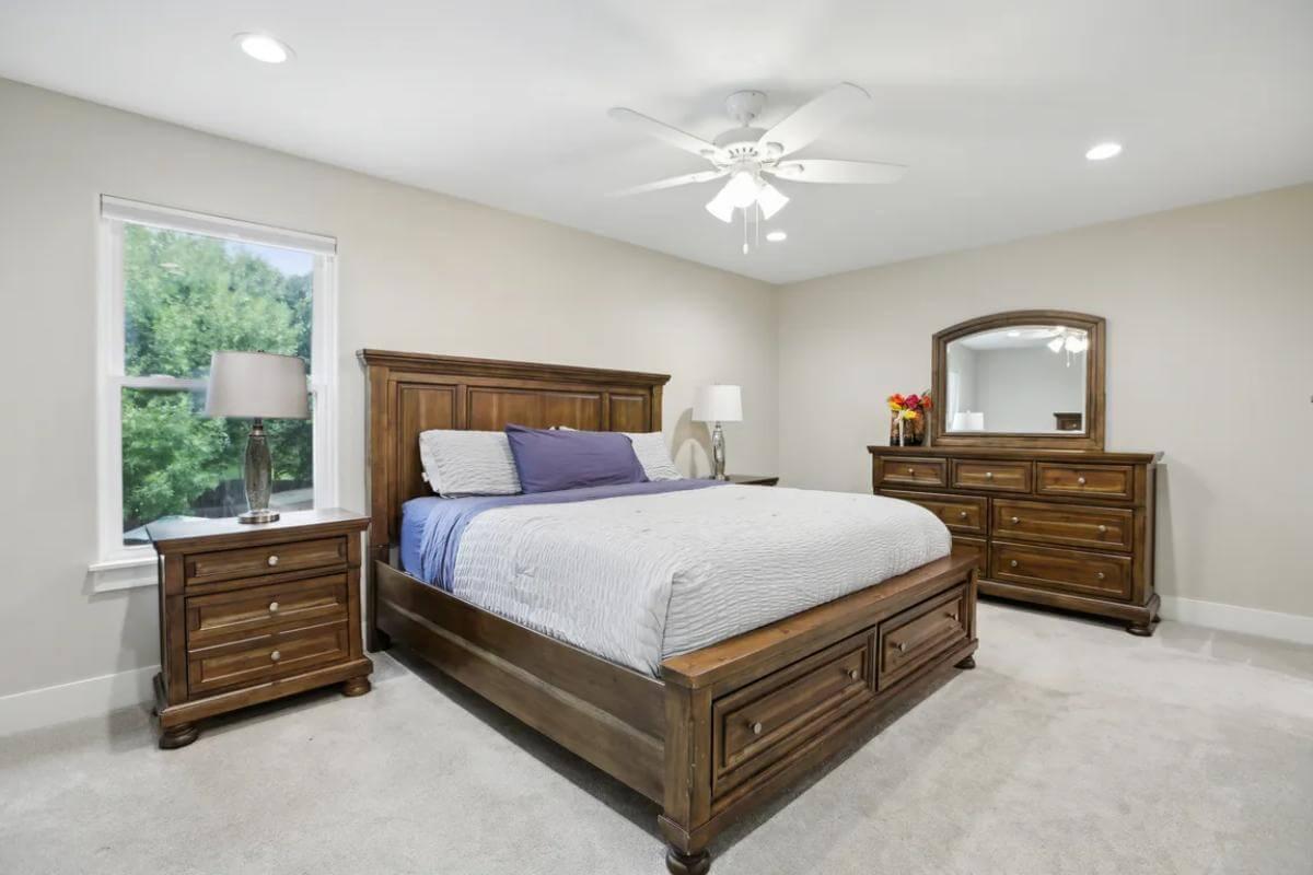Warm Bedroom with Rich Wood Furniture and Calming Palette