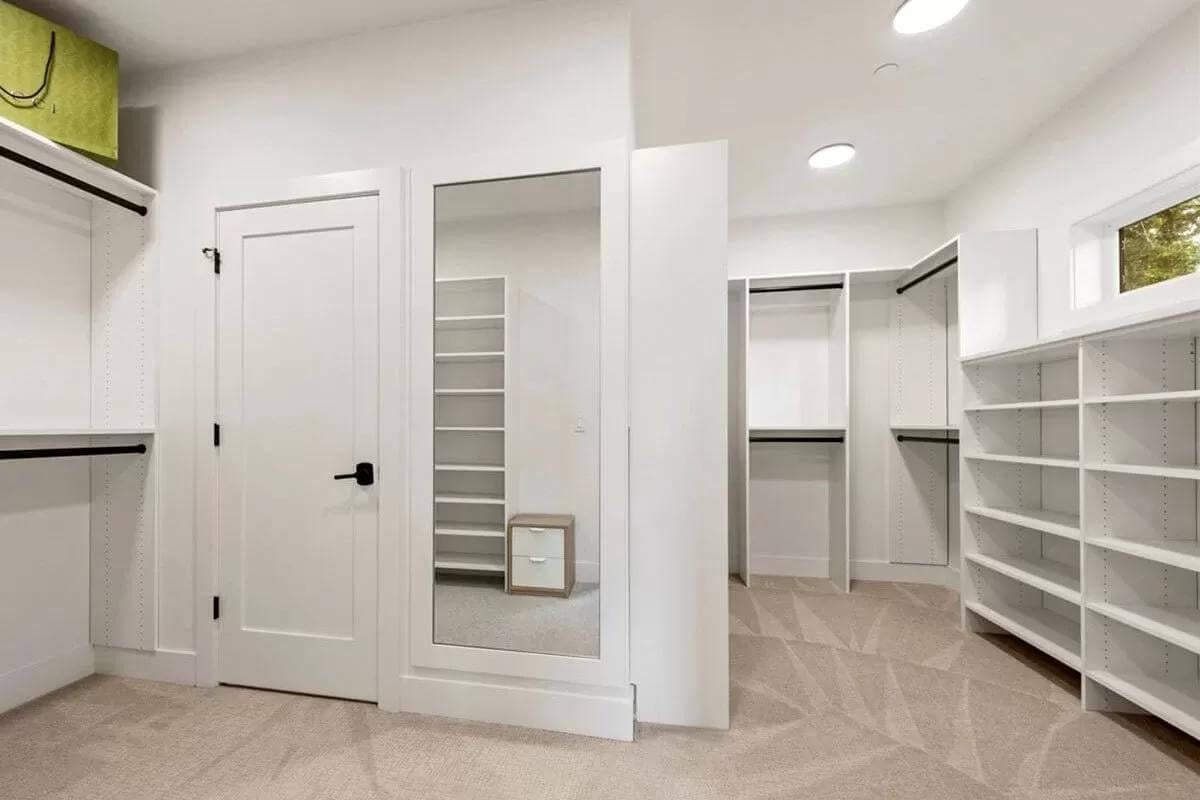 Explore the Clever Storage Solutions in This Spacious Walk-In Closet