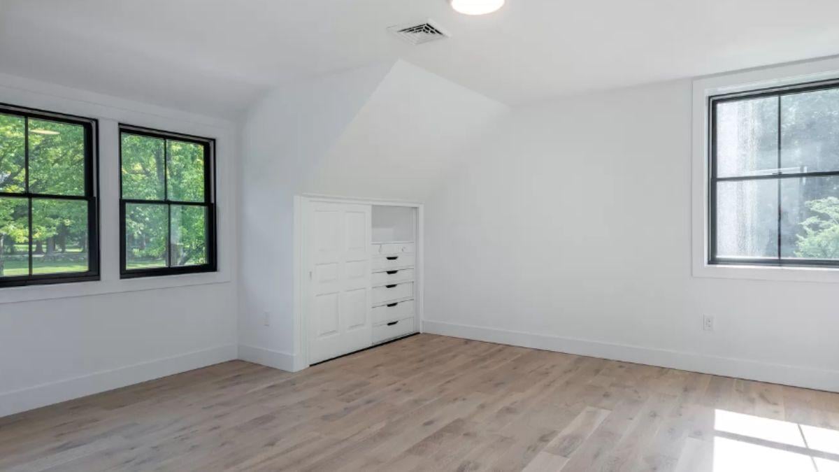 Explore the Bright Spare Room with Smart Built-In Storage
