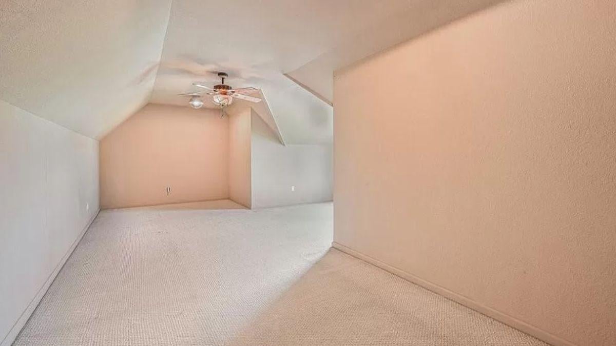 Explore the Versatility of This Spacious Attic Room