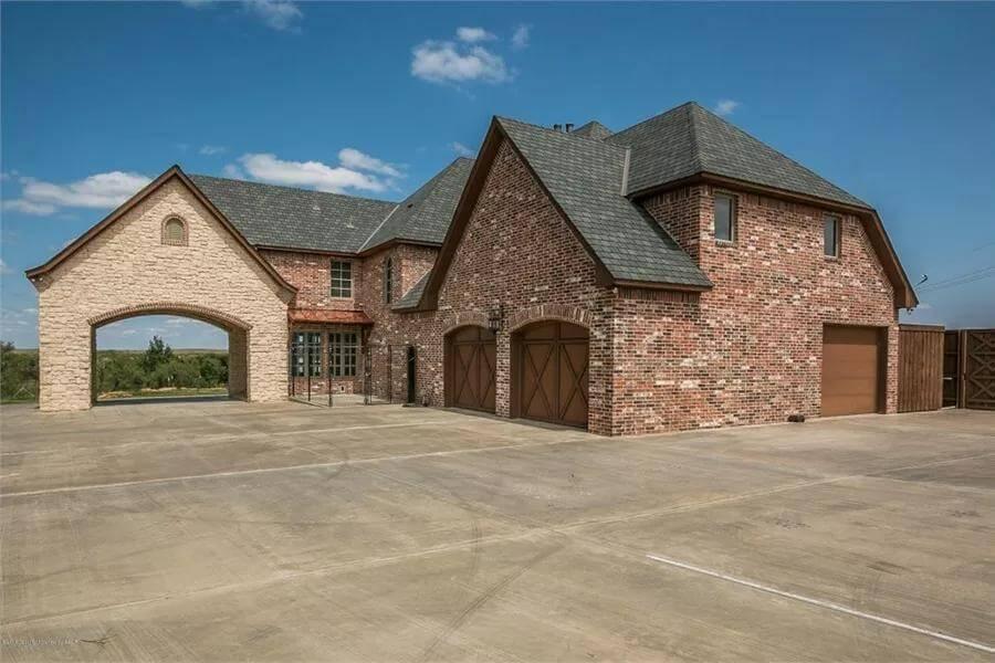 Wow, Check Out the Brickwork on This Spacious Garage and Porte-Cochere
