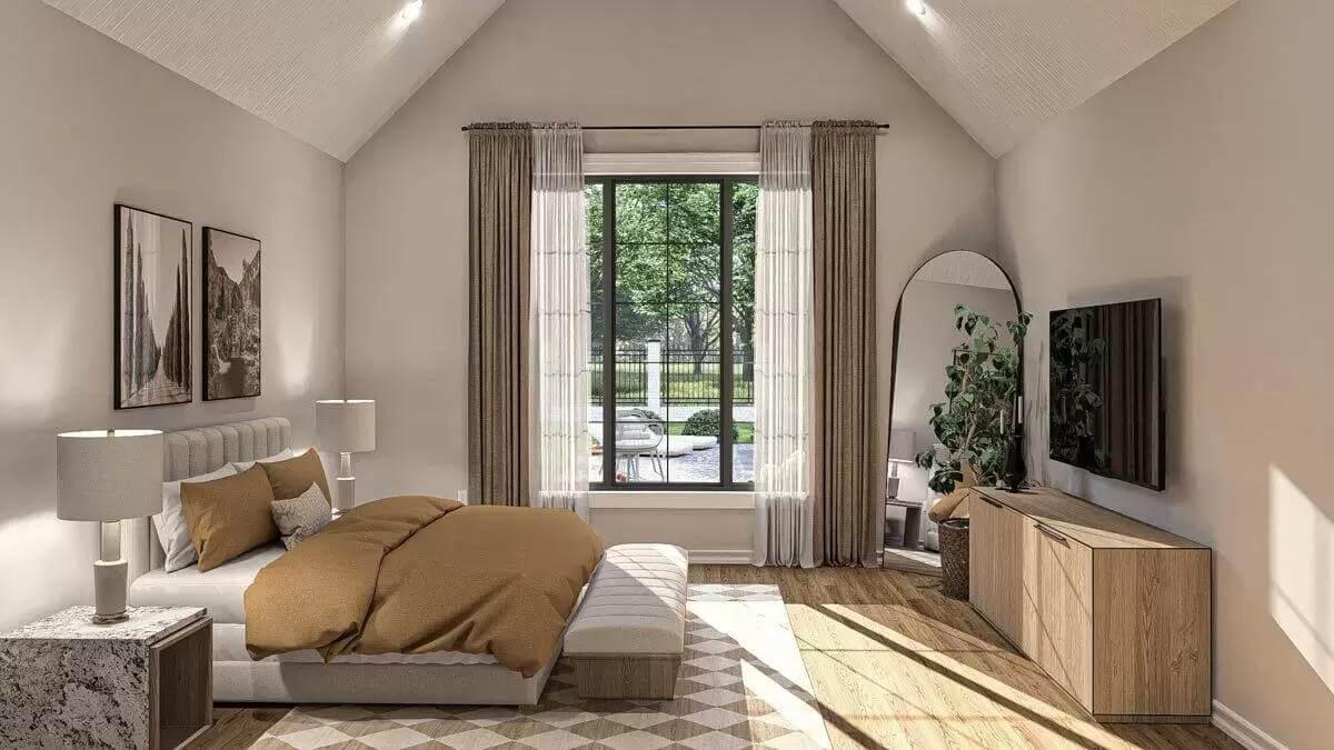 Notice the Vaulted Ceiling and Large Window in This Serene Bedroom