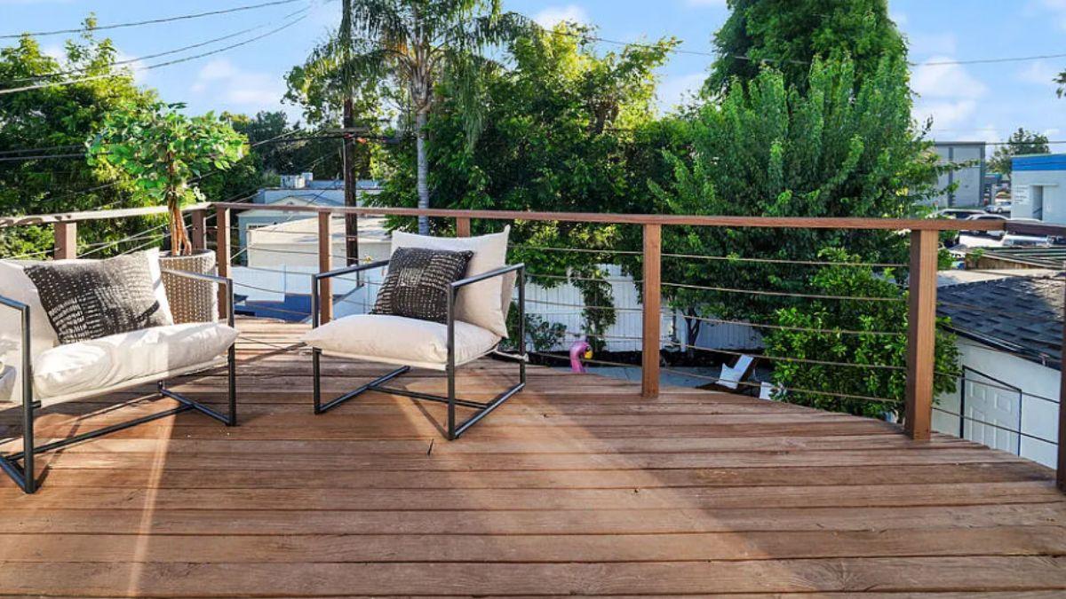 Relax on This Elevated Deck with Modern Metal Railings