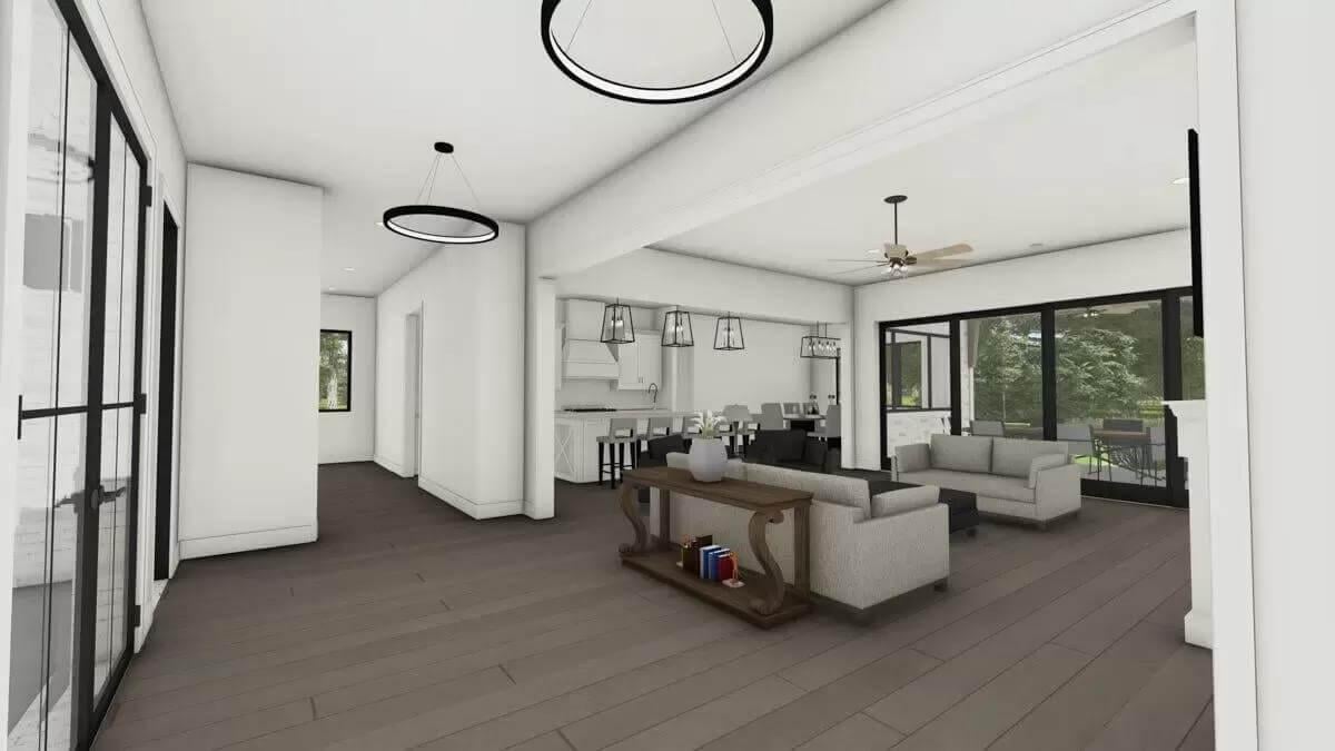 Step Inside This Open Living and Dining Space โ Notice the Central Light Fixtures