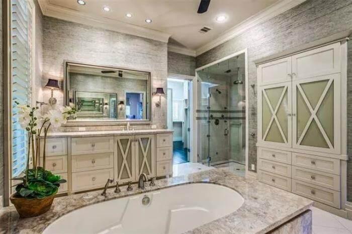 Elegant Bathroom with Luxurious Marble Finishes and Smart Storage