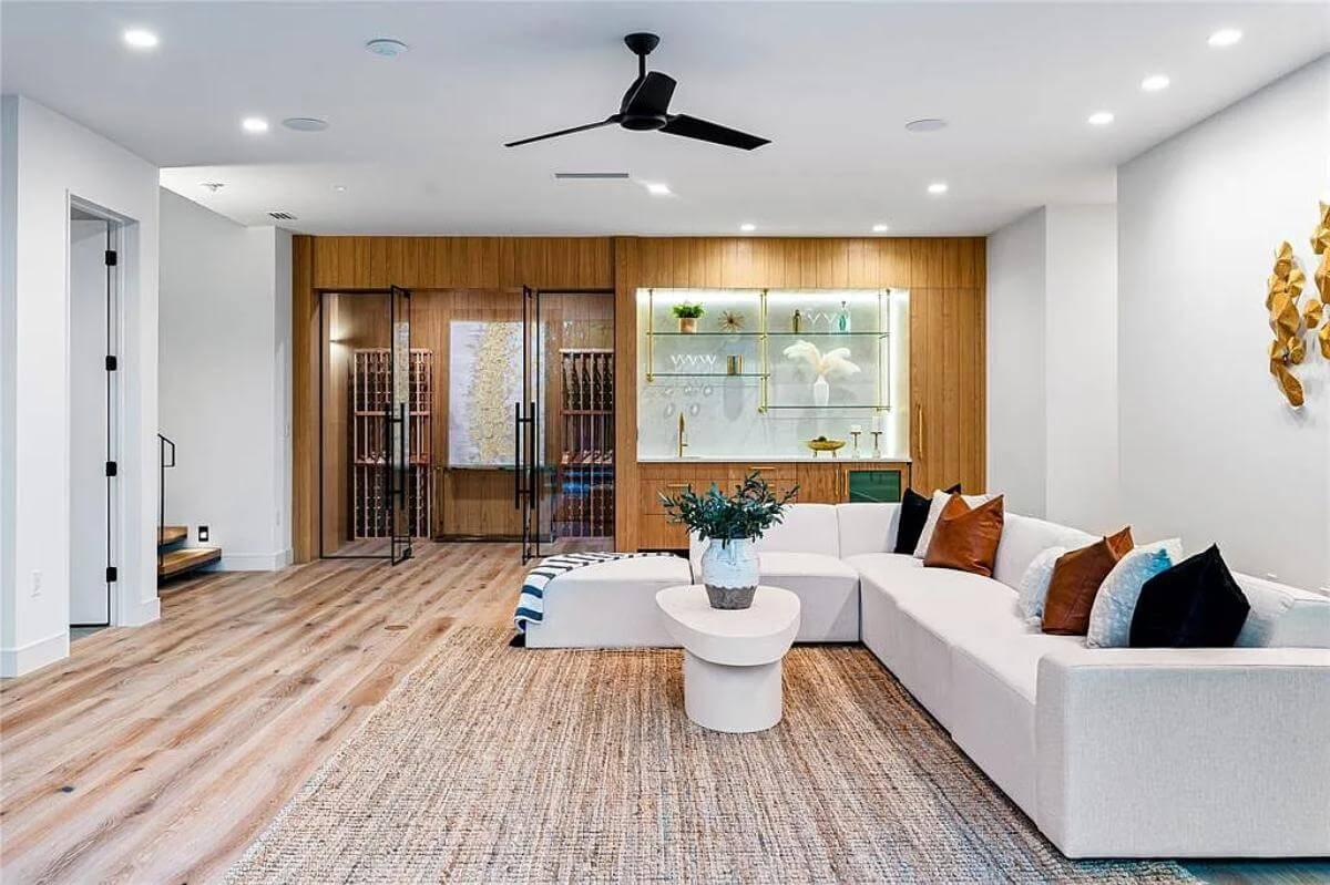 Explore This Chic Lounge with a Sleek Wine Cellar