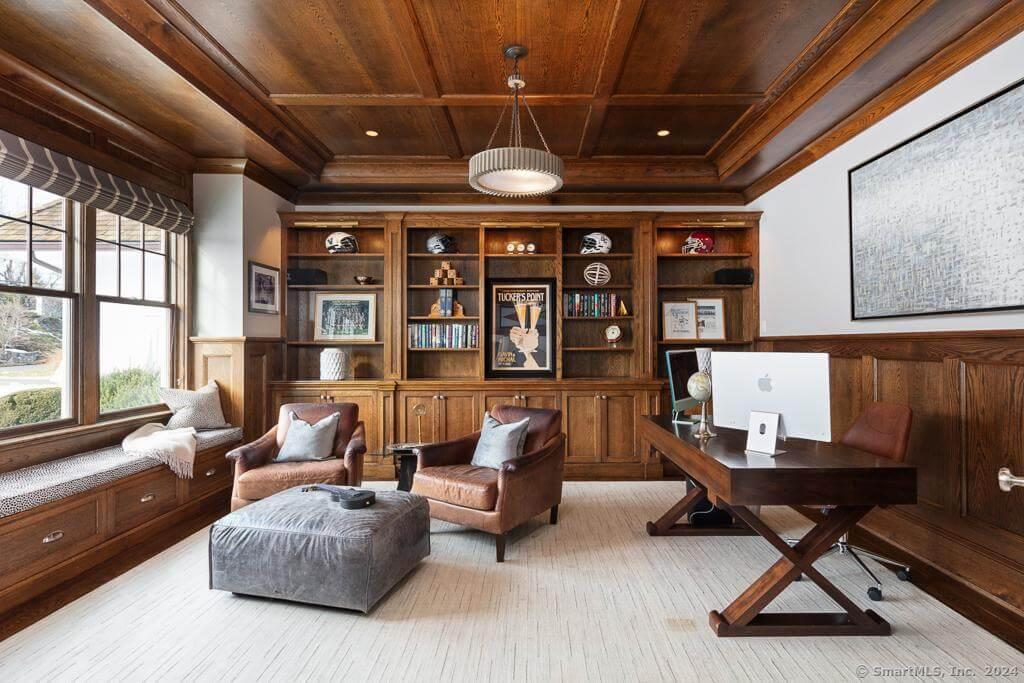 Home Office with Rich Woodwork and Cozy Window Seat