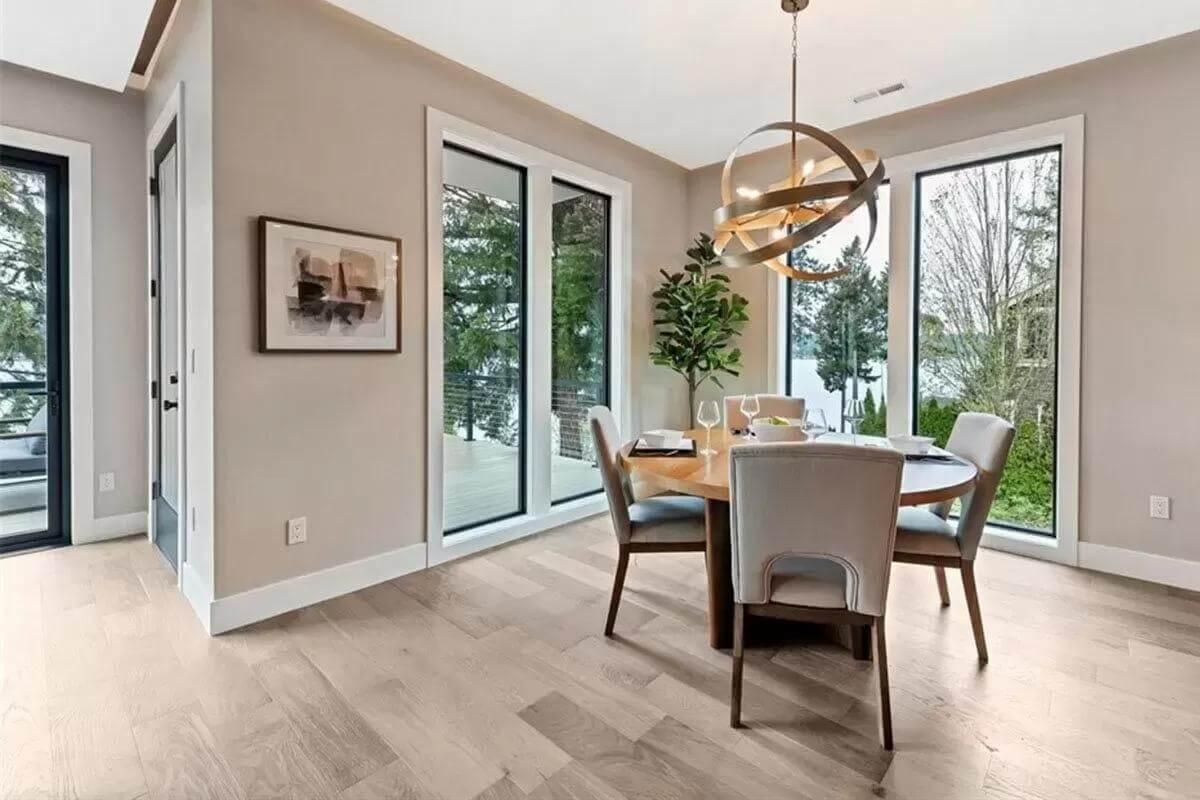 Cozy Dining Nook with Scenic Views and Unique Chandelier