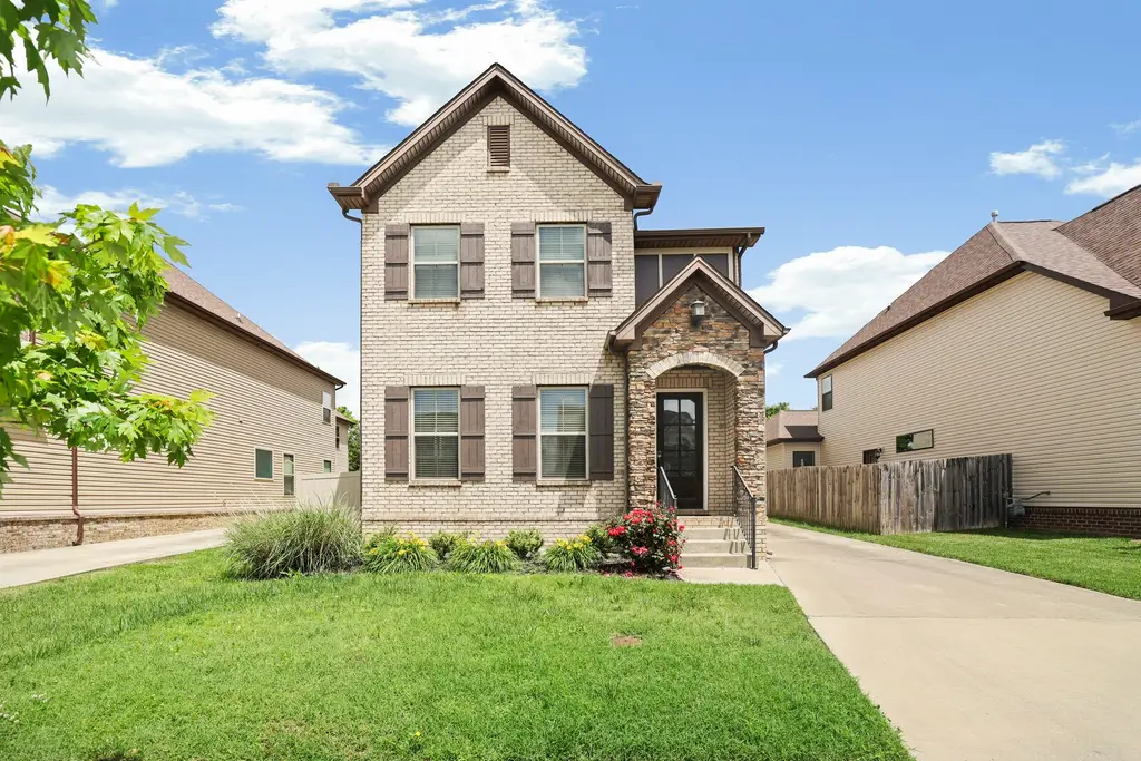Traditional-Style 3-Bedroom Home for a Narrow Lot with Bonus Room and Rear-Entry Two-Car Garage (2,777 Sq. Ft. Floor Plan)