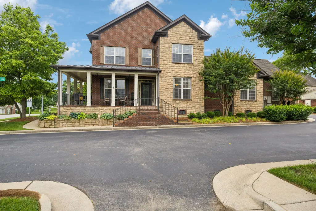 Traditional 4-Bedroom Colonial Home with Open-Concept Layout and Wraparound Porch (2,673 Sq. Ft. Floor Plan)