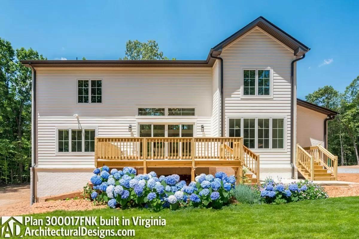 Take In This Classic Craftsman Exterior with a Spacious Wooden Deck