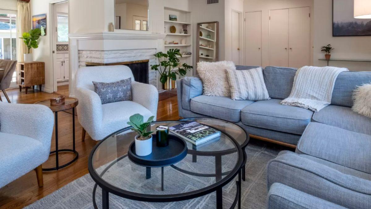 Explore This Living Room with a Mid-Century Fireplace and Soft Accents
