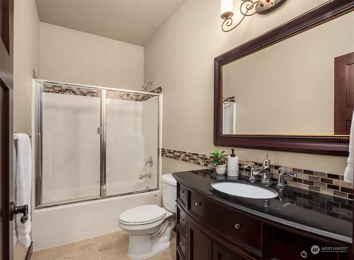 Notice the Mosaic Tile Accents in This Craftsman Bathroom