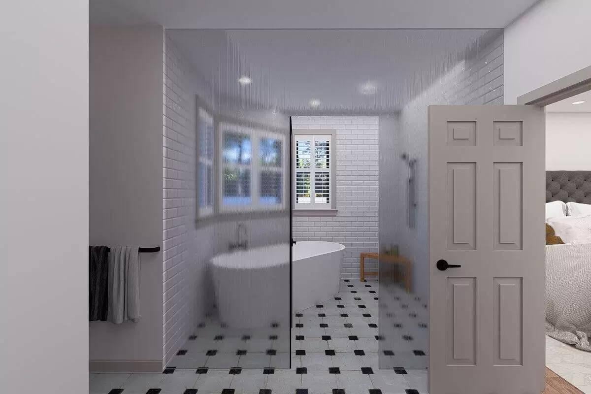 Spot the Freestanding Tub and Classic Tile Pattern in This Elegant Bathroom