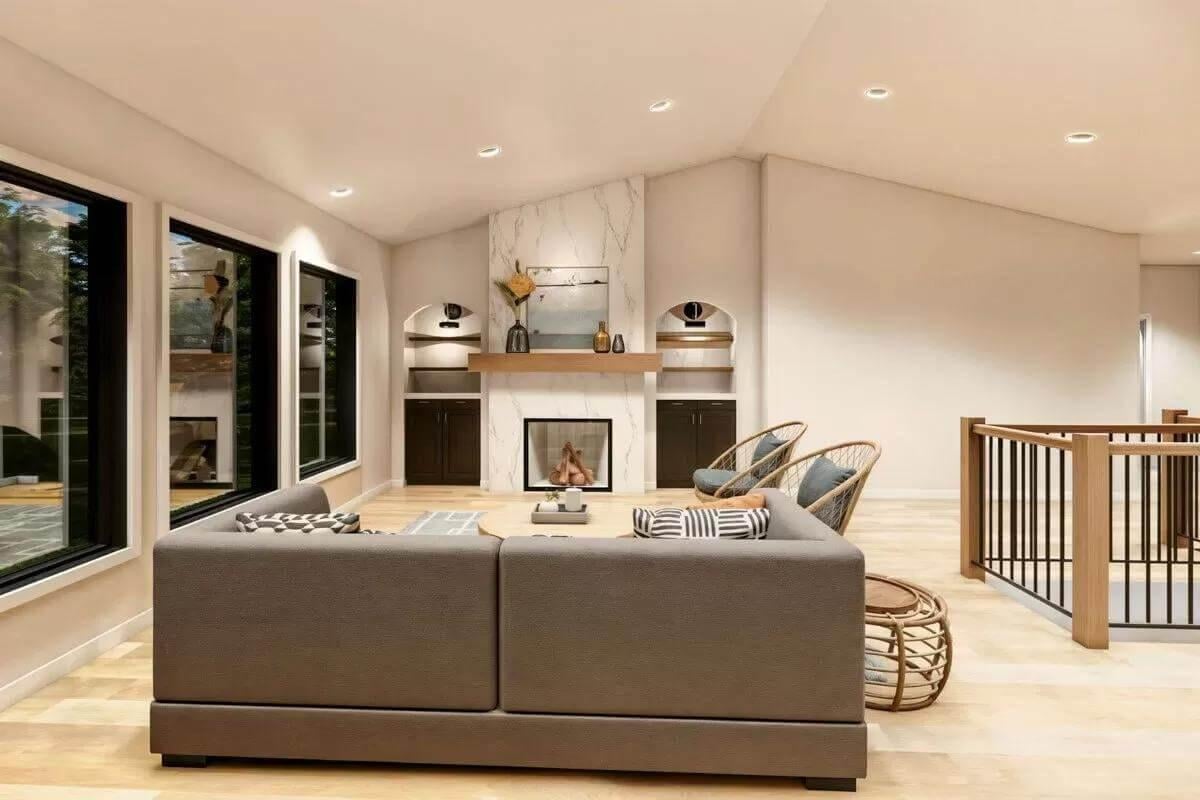 Wow, This Living Room Boasts a Marble-Clad Fireplace and Cozy Seating