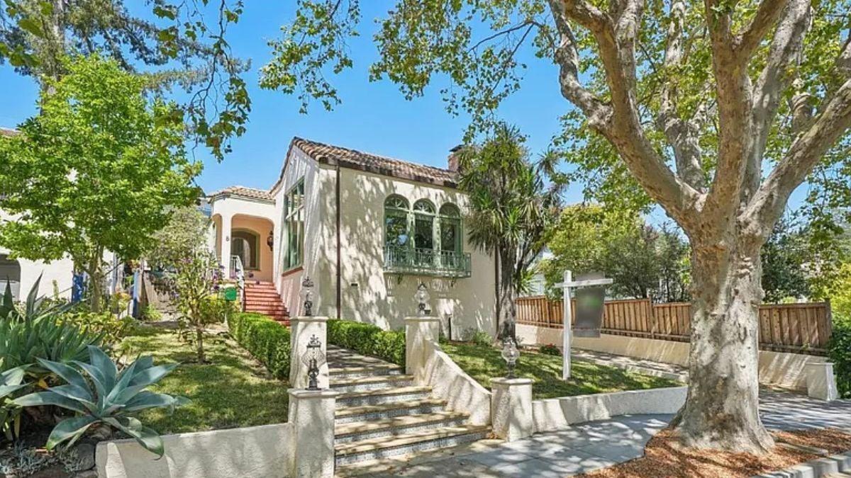 Notice the Mediterranean Charm with Arched Windows and Terracotta Roof