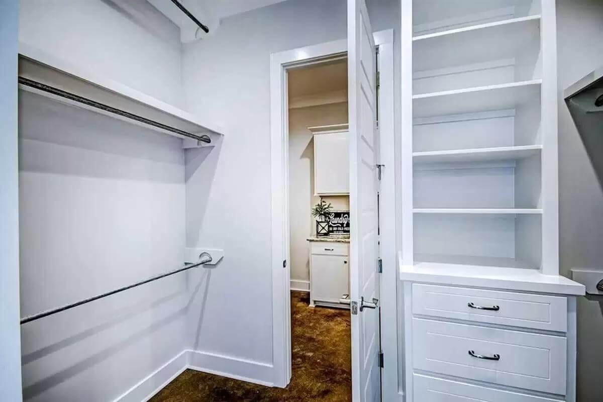 Craftsman Closet with Integrated Shelving and Convenient Passage