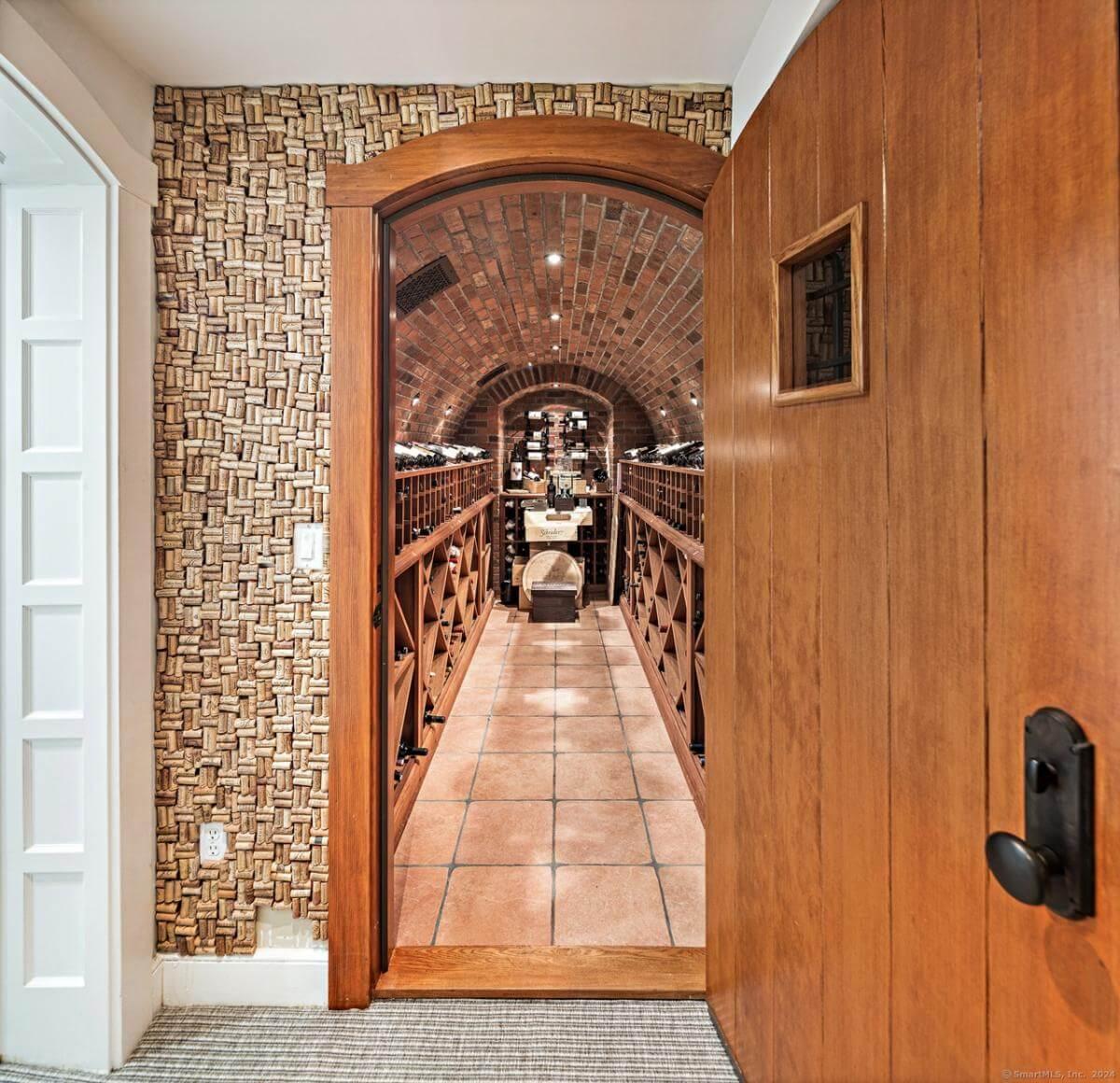 Step Inside This Craftsman-Inspired Wine Cellar with Barrel Vault Ceiling