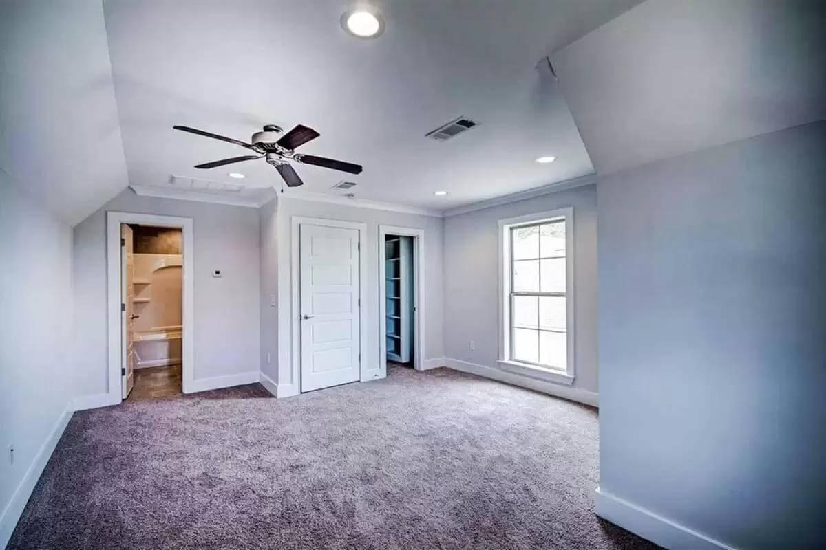 Check Out the Spacious Bonus Room with a Handy Ceiling Fan