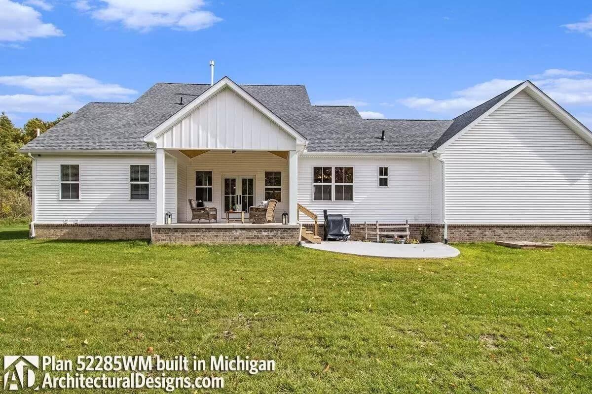 Spacious Backyard Patio with Overhead Cover for Year-Round Enjoyment