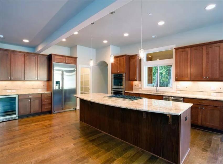 Look at the Spacious Granite-Topped Island in This Craftsman Kitchen