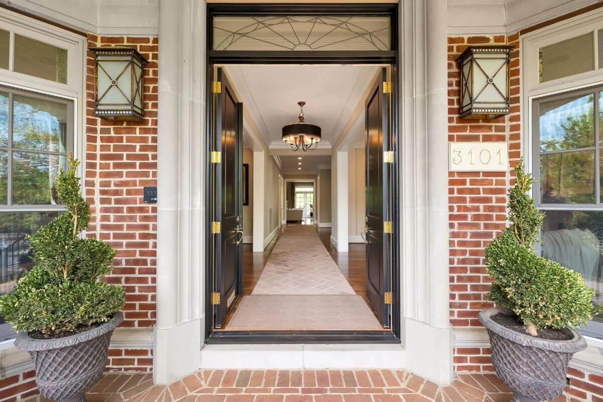 Step Inside Through These Elegant Black Double Doors