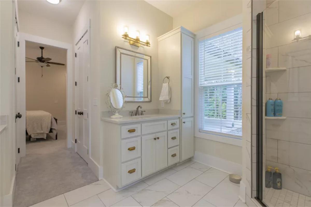 Take a Look at the Brass Fixtures in This Elegant Craftsman Bathroom
