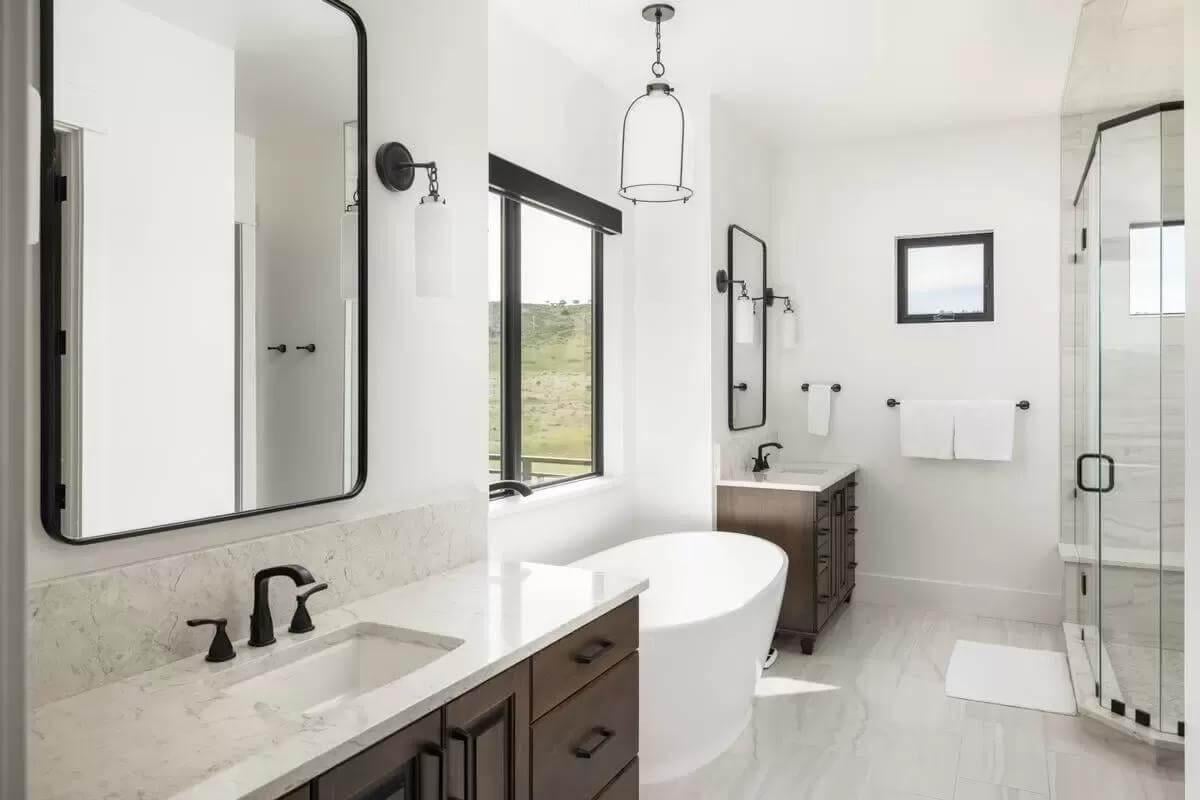 Bright Bathroom Oasis with a Freestanding Tub as the Star