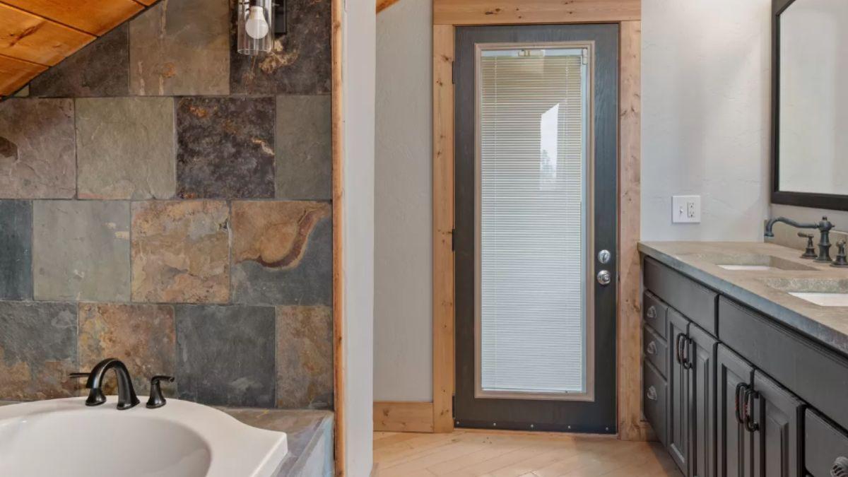 Nature Meets Luxury in This Stone-Accented Bathroom