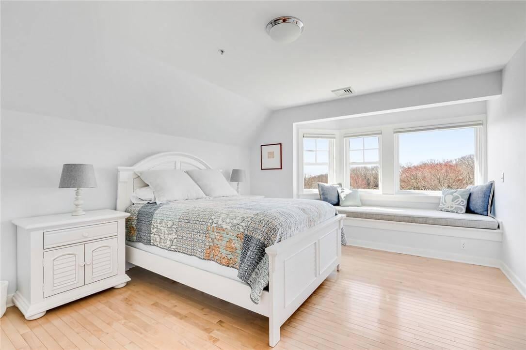 Notice the Charming Window Seat in This Light-Filled Bedroom